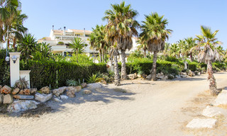 Oasis de Banus: Apartamentos de lujo frente a la playa en venta en la Milla de Oro, Marbella, a poca distancia de Puerto Banús 23066 