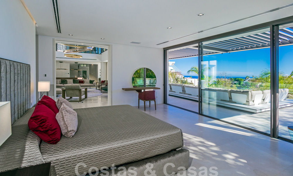 Nueva y moderna villa de lujo de 6 dormitorios en venta con vistas al mar en La Quinta, Marbella - Benahavis 54330