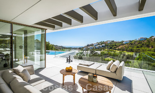 Villa de lujo de diseño en venta en exclusivo complejo cerrado en primera línea de golf con vistas panorámicas en La Quinta, Marbella - Benahavis 59071 