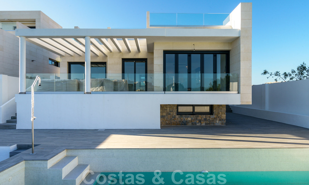 Nueva promoción de modernas villas de lujo en venta, en primera línea de golf con vistas al mar en Mijas, Costa del Sol 62463