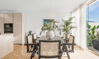 Sofisticado apartamento de lujo con vistas al lago, a la montaña y al mar en venta en Nueva Andalucía, Marbella 64485 