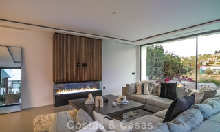Villa de lujo moderna lista para entrar a vivir en venta junto al campo de golf en la Nueva Milla de Oro, Marbella - Estepona 66429 