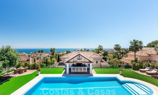 Villa de lujo en estilo clásico con vistas al mar en venta en Sierra Blanca, Marbella 22198 