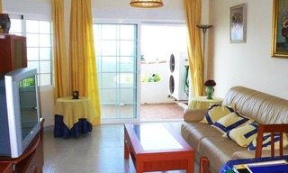 Apartamento en primera línea de playa a la venta en Mijas Costa en la Costa del Sol 3
