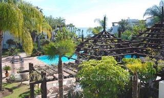 Espacioso apartamento de lujo para comprar en un complejo situado en primera línea de playa en la Milla de Oro – Marbella 1