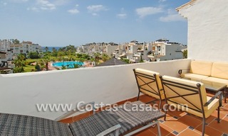 Ático de 4 dormitorios a la venta en complejo en primera línea de playa en Marbella 1