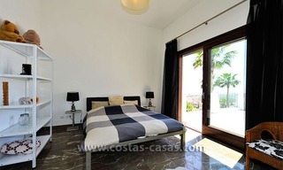 Villa de lujo de estilo moderno andaluz en venta, en Complejo de golf entre Marbella y Estepona 28