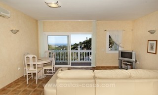 Una villa encantadora de 4 dormitorios en venta en la exclusiva comunidad privada de El Madroñal en Marbella - Benahavis, con excelentes vistas al mar 33