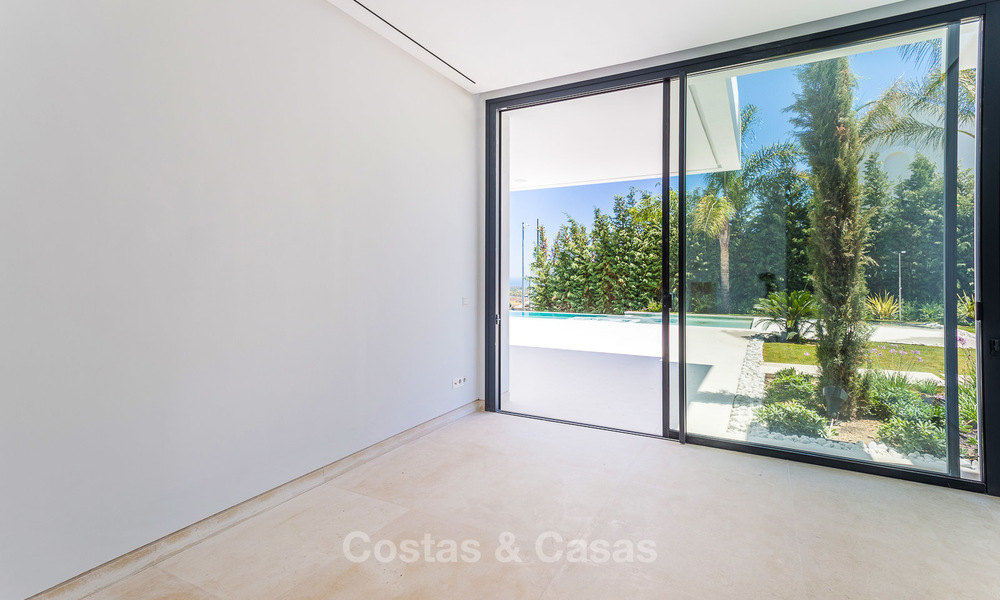 Majestuosa villa moderna con vistas panorámicas al mar en venta, primera línea de golf, Benahavis - Marbella 6841