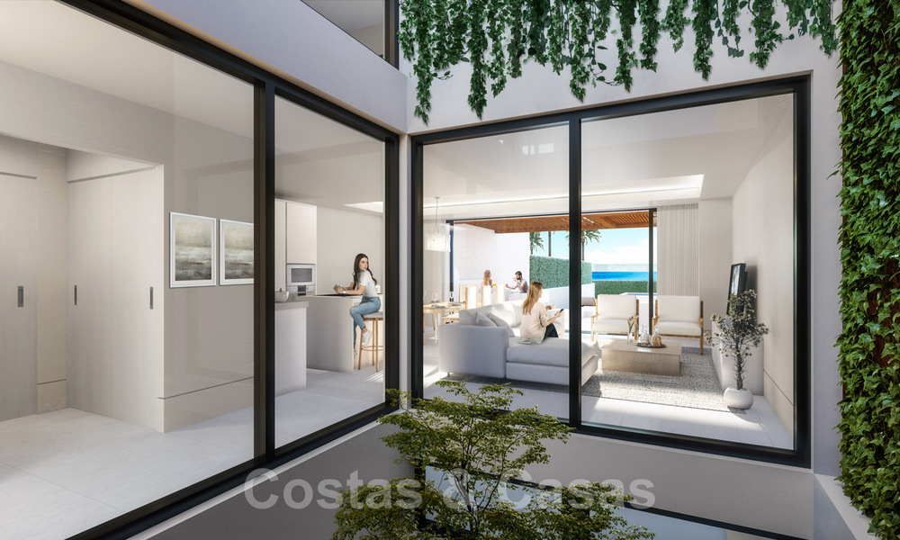 Nuevas villas de lujo en primera línea de playa en venta en un exclusivo complejo, New Golden Mile, Marbella 40489