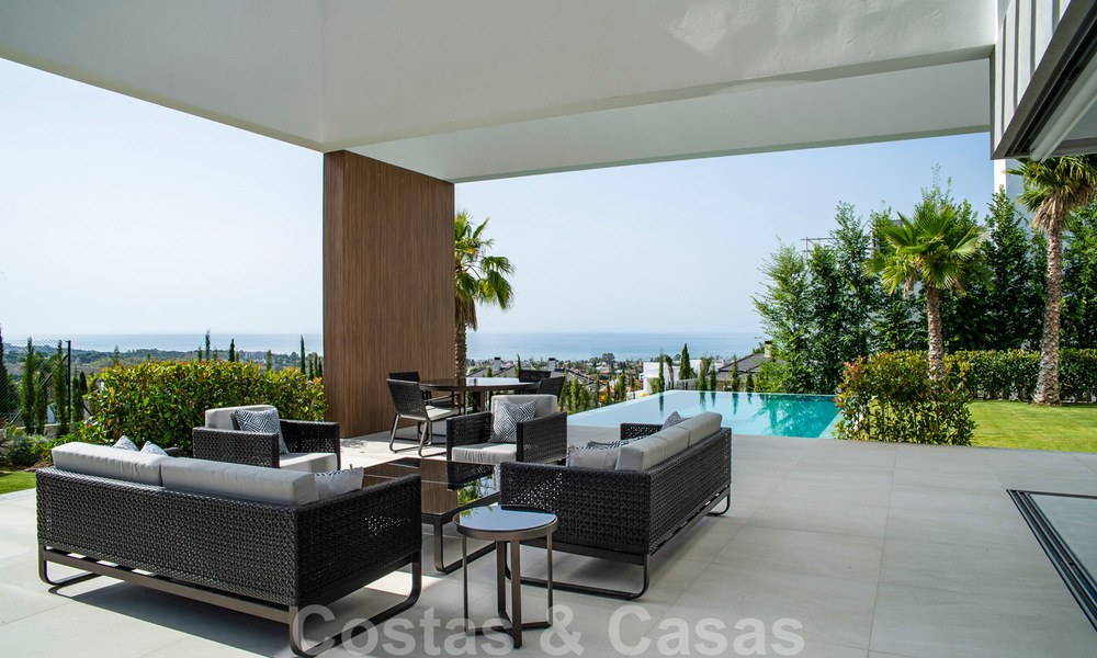 Villa de lujo contemporánea a estrenar con vistas panorámicas al mar en venta, en un exclusivo resort de golf en Benahavis - Marbella 26519