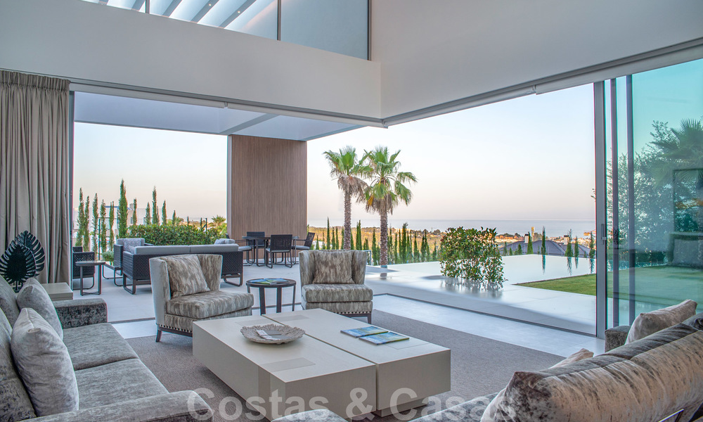 Villa de lujo contemporánea a estrenar con vistas panorámicas al mar en venta, en un exclusivo resort de golf en Benahavis - Marbella 26545