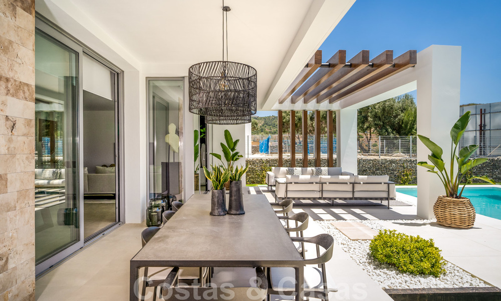 Exclusivas villas de golf contemporáneas con impresionantes vistas al mar en venta - Este de Marbella 26707