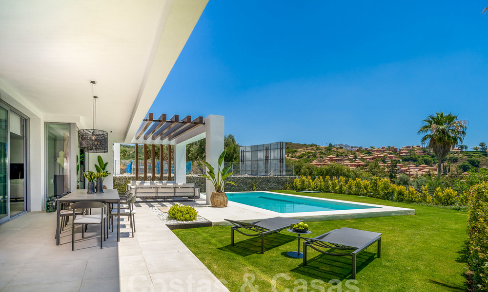 Exclusivas villas de golf contemporáneas con impresionantes vistas al mar en venta - Este de Marbella 26708