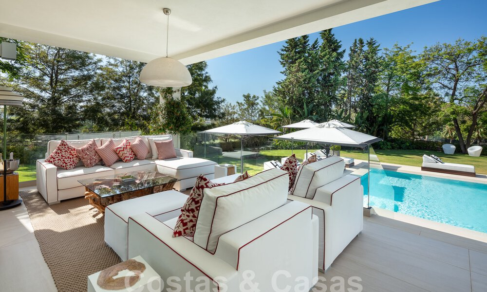 Prestigiosa villa de lujo con excepcionales vistas al mar en venta, primera línea de golf y lista para ser habitada en Nueva Andalucia - Marbella 57172