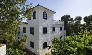 Encantadora villa de estilo tradicional con vistas al mar y a la montaña en venta en El Madroñal – Benahavis – Marbella 12628 