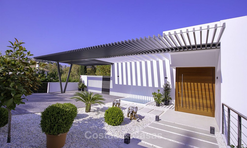 A estrenar y lista para mudarse. Villa moderna en venta cerca del Valle del Golf en Benahavis - Marbella 14616