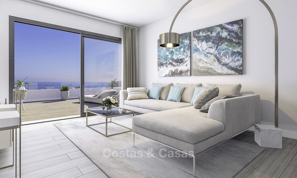Elegantes y modernos apartamentos y áticos con impresionantes vistas al mar en venta, a poca distancia de la playa en Estepona 15003