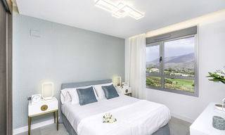 Modernos apartamentos y áticos de lujo en venta en un prestigioso resort de golf en Mijas - Costa del Sol 16682 