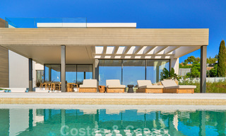 Una obra maestra única, villa de lujo moderna con impresionantes vistas al mar a la venta, en primera línea de golf en un resort de primera clase, Benahavis - Marbella 36660 