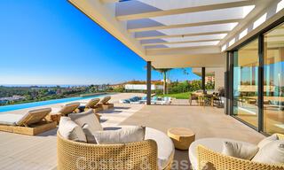 Una obra maestra única, villa de lujo moderna con impresionantes vistas al mar a la venta, en primera línea de golf en un resort de primera clase, Benahavis - Marbella 36663 