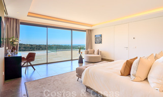 Una obra maestra única, villa de lujo moderna con impresionantes vistas al mar a la venta, en primera línea de golf en un resort de primera clase, Benahavis - Marbella 36675 
