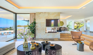 Una obra maestra única, villa de lujo moderna con impresionantes vistas al mar a la venta, en primera línea de golf en un resort de primera clase, Benahavis - Marbella 36684 