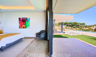Una obra maestra única, villa de lujo moderna con impresionantes vistas al mar a la venta, en primera línea de golf en un resort de primera clase, Benahavis - Marbella 36694 