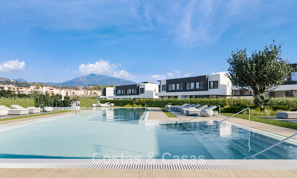 Atractivas nuevas villas adosadas a la venta en el Triángulo de Oro, Estepona Este 802399