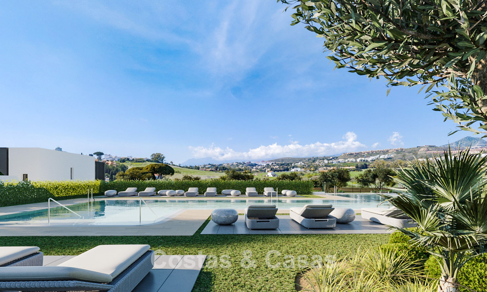 Atractivas nuevas villas adosadas a la venta en el Triángulo de Oro, Estepona Este 802412