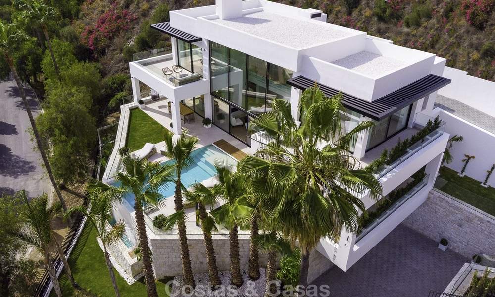Una villa de lujo contemporánea, nueva y lista para ser habitada, con impresionantes vistas al mar, a la venta en un codiciado club de golf, Benahavis, Marbella 19558