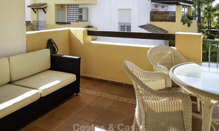 Atractivo apartamento en venta en un cuidado complejo frente a la playa, Marbella Este 19596 