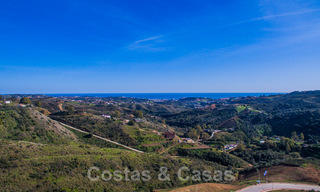 Atractivo terreno de construcción con orientación sur y vistas espectaculares en venta, en un complejo de golf de clase mundial, Mijas, Costa del Sol 24097 