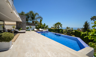 Moderna villa de lujo con vistas panorámicas al mar en venta en la prestigiosa Milla de Oro de Marbella 20999 