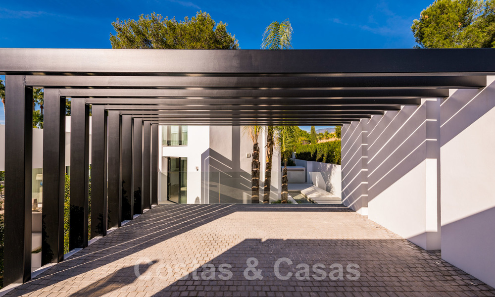 Una villa de lujo contemporáneo muy elegante en venta en el corazón del Valle del Golf, lista para mudarse - Nueva Andalucía, Marbella 21834