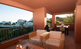 Apartamentos de lujo a la venta en Royal Flamingos con impresionantes vistas al golf y al mar en Marbella - Benahavis 23587 