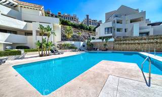 Modernos apartamentos de lujo en primera línea de golf con impresionantes vistas al golf y al mar en venta en Marbella - Benahavis 24062 