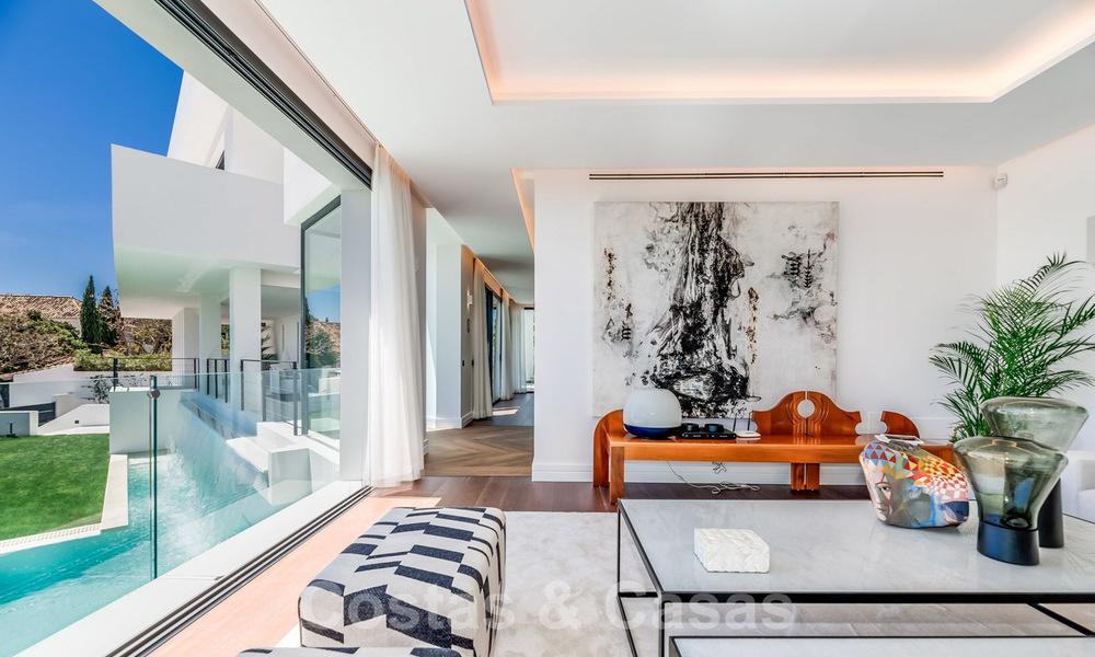 Moderna villa con vistas al mar en venta en Los Flamingos Golf en Marbella - Benahavis. Precio reducido. 26009