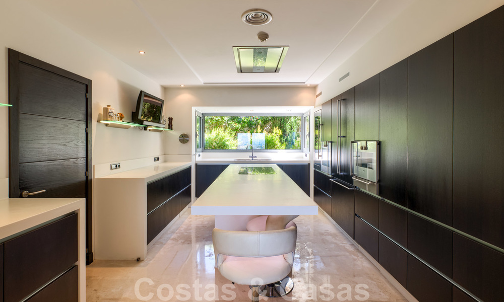 Moderna villa con vistas panorámicas al golf y al mar en venta en Los Flamingos Golf en Marbella - Benahavis 26022