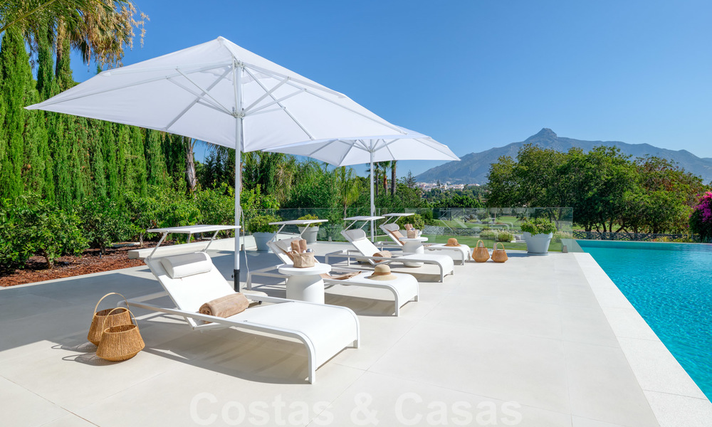 Exclusiva villa nueva y moderna en venta a un paso de Las Brisas golf en el Valle de Nueva Andalucía, Marbella 27430