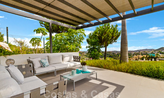 Lista para mudarse exclusiva villa de lujo moderna en venta en Benahavis - Marbella con impresionantes vistas abiertas sobre el golf y el mar 33542 