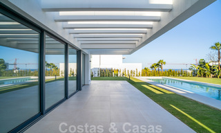 Lista para entrar a vivir, nueva villa moderna en venta en un resort de golf de cinco estrellas en Marbella - Benahavis 34473 