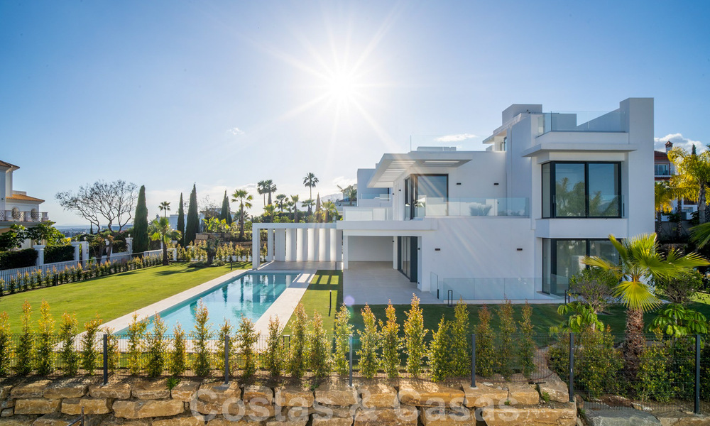 Lista para entrar a vivir, nueva villa moderna en venta en un resort de golf de cinco estrellas en Marbella - Benahavis 34482