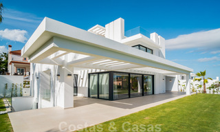 Lista para entrar a vivir, villa moderna de nueva construcción en venta en un resort de golf de cinco estrellas en Marbella - Benahavis 34548 