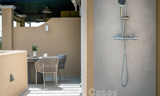 Apartamento moderno reformado en venta con amplia terraza, vistas al mar y a la montaña en la Quinta golf resort, Benahavis - Marbella 34857 