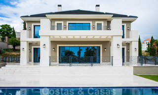 Nueva villa en venta de estilo clásico contemporáneo con vistas al mar en un resort de golf de cinco estrellas en Marbella - Benahavis 34883 