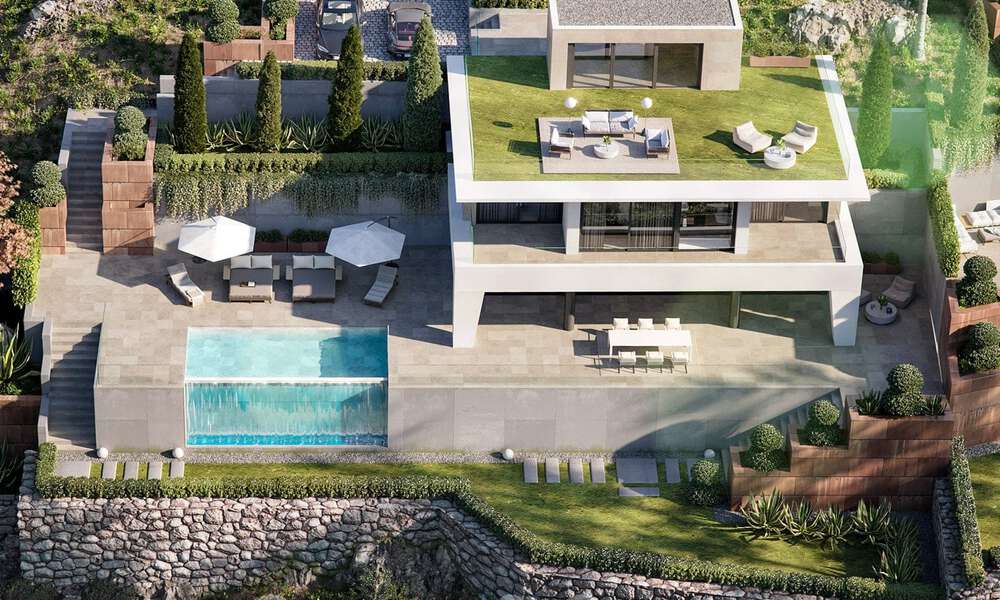 Modernas villas de lujo de nueva construcción en venta con una gran terraza y hermosas vistas panorámicas al mar en la Costa del Sol 35201
