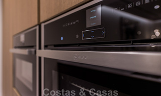 Exclusivo apartamento en venta con vistas al mar en un complejo en primera línea de playa en la Nueva Milla de Oro, Marbella - Estepona 35552 