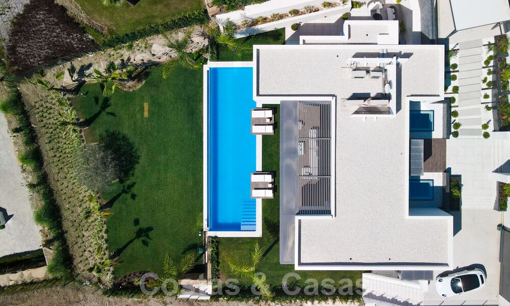 Lista para entrar a vivir, nueva villa de diseño moderno con impresionantes vistas en venta en Marbella - Benahavis 36058