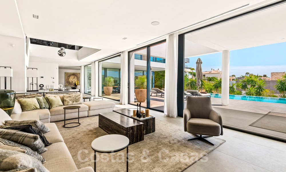 Villa de lujo en venta lista para entrar a vivir con impresionantes vistas al golf, en una prestigiosa zona en Benahavis - Marbella 38136